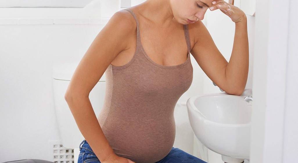 Почему болит спина при беременности