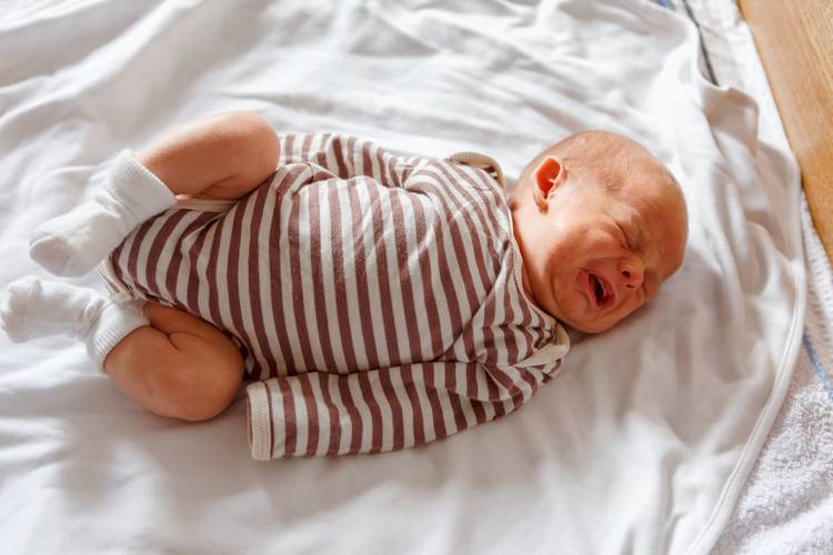 Новорожденный в 1 месяц кряхтит и стонет во сне