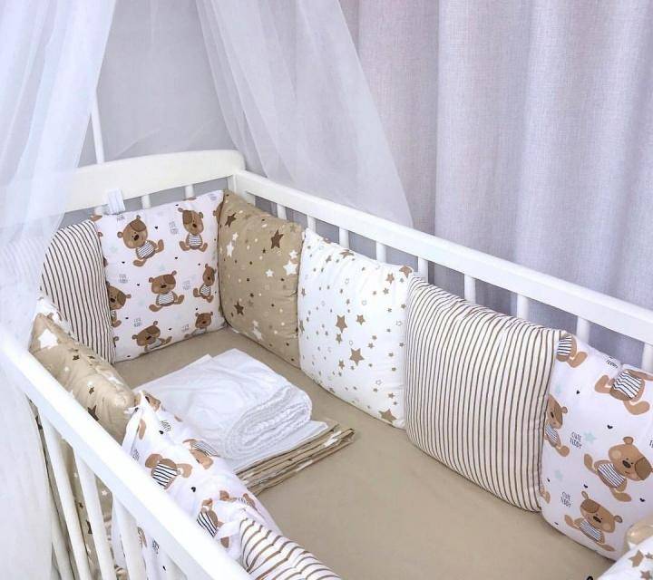 Бортики в кроватку для новорожденных: фото, особенности выбора